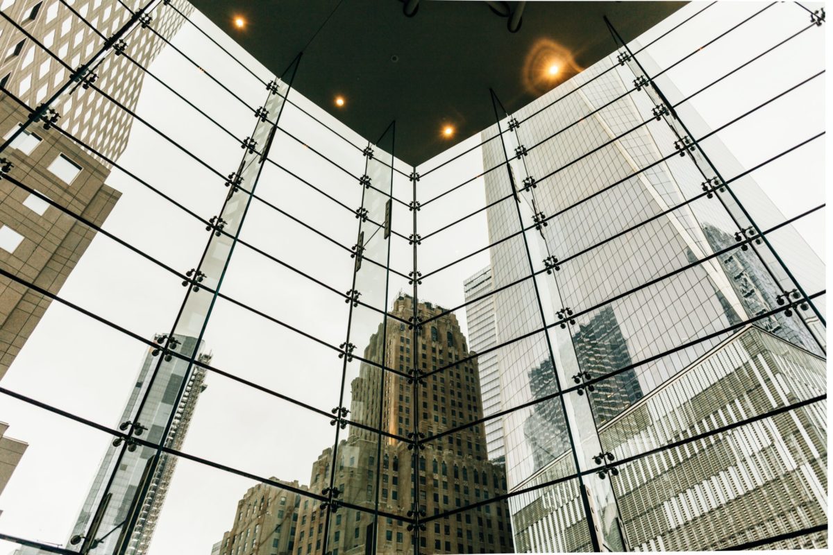 Looking out glass windows into a city